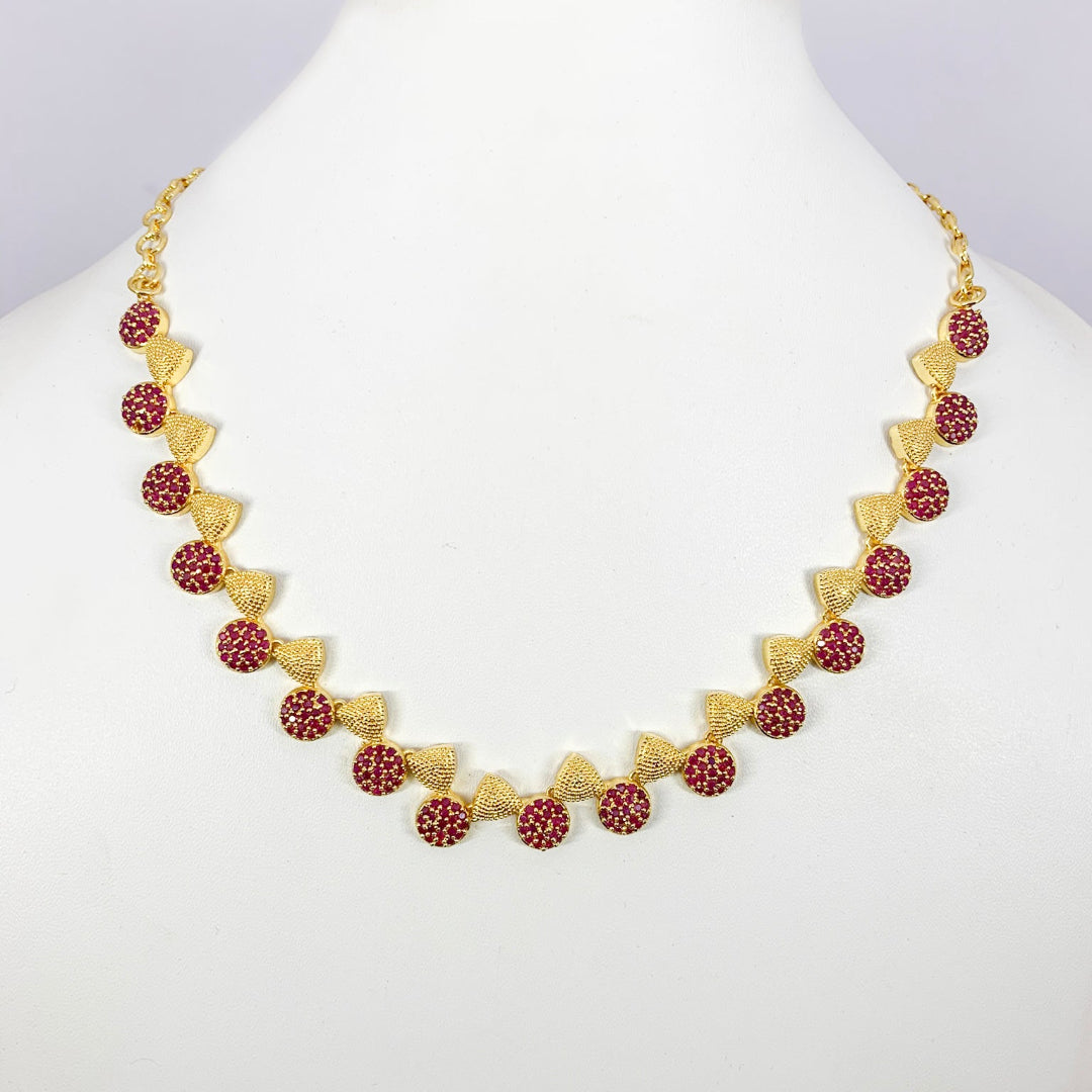 Delicate gold-plated necklace featuring a ruby stone bow design – perfect for gifting or graceful everyday wear