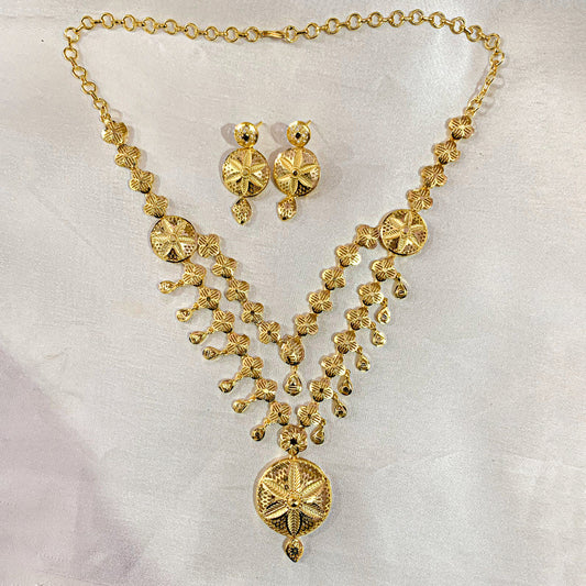 Gold-plated layered floral necklace set with matching earrings – traditional Indian jewelry for weddings and festive occasions
