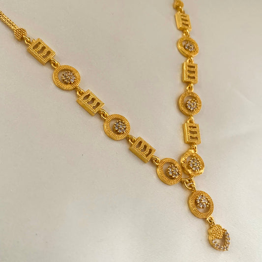 Stylish gold-plated necklace with geometric pendant and cubic zirconia drop – perfect for casual and party wear