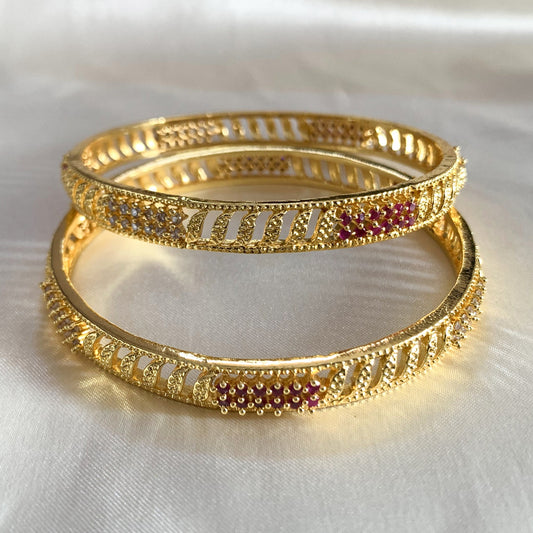 Traditional Indian bangles with gold plating and ruby-crystal detailing – perfect for weddings and special occasions
