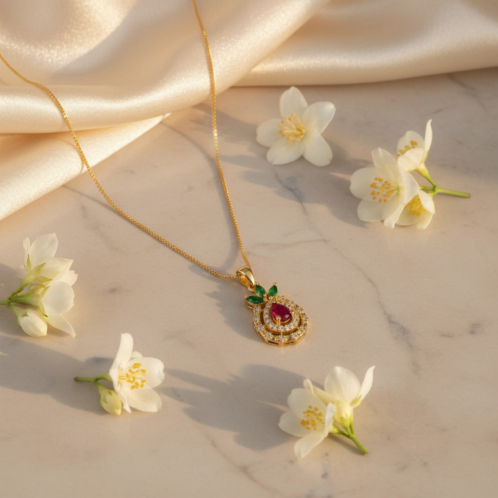 22K Gold Plated Ruby Drop Pendant with Green Leaf Design