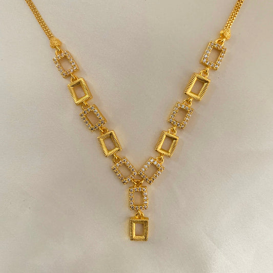 Contemporary AD stone necklace in gold plating with bold geometric accents – elegant accessory for modern ethnic and western outfits