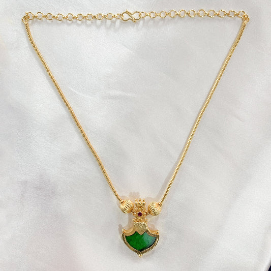 Traditional gold-plated necklace with green Palakka shield pendant – ethnic South Indian jewelry for festive and bridal wear