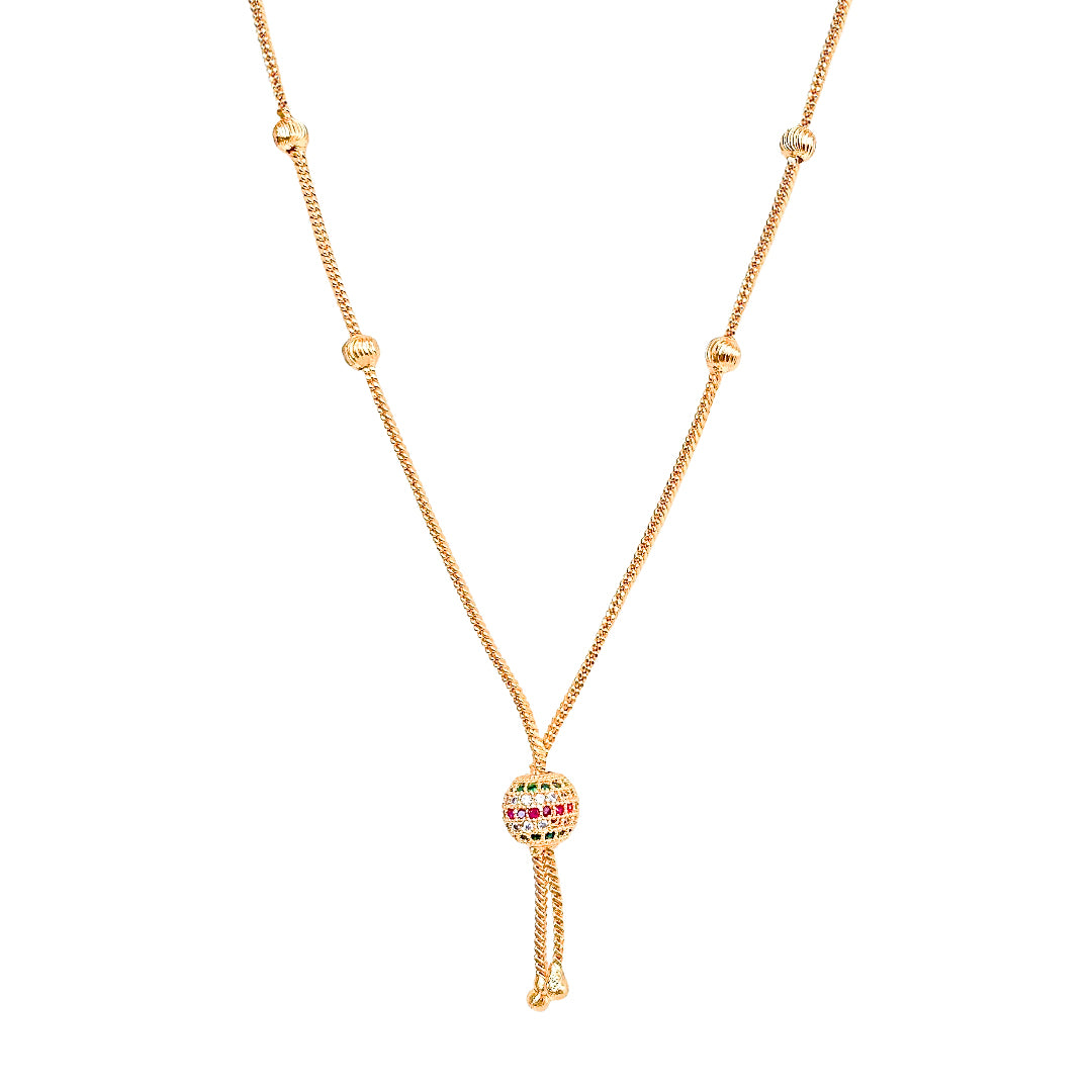 Gold necklace with a unique pendant on a white background