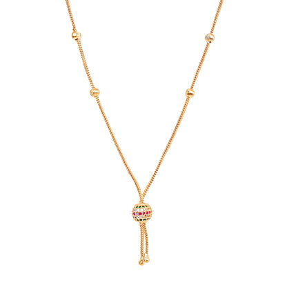 Gold necklace with a unique pendant on a white background