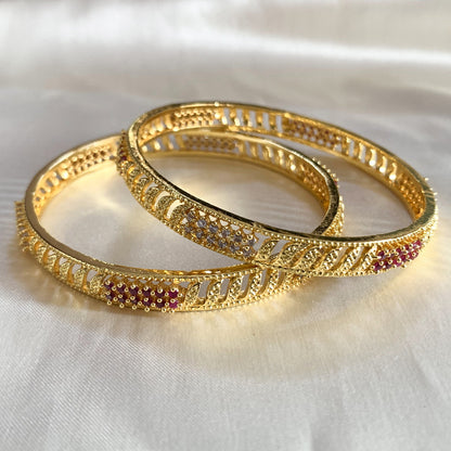 Elegant gold-plated ethnic bangles studded with ruby and crystal stones – classic jewelry for women