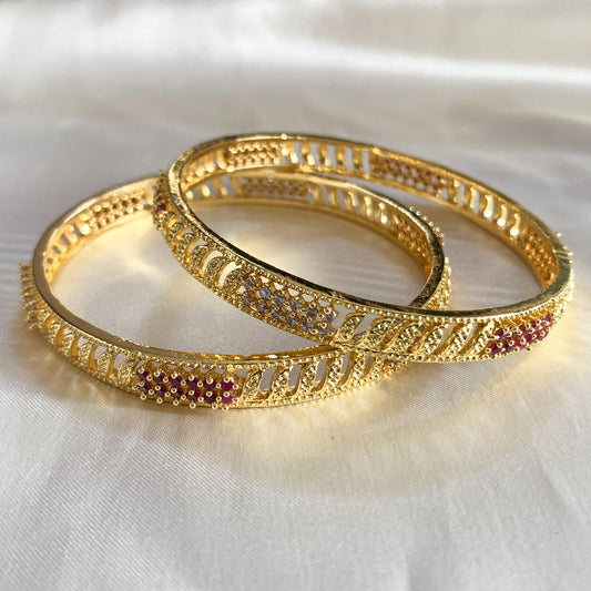 Elegant gold-plated ethnic bangles studded with ruby and crystal stones – classic jewelry for women