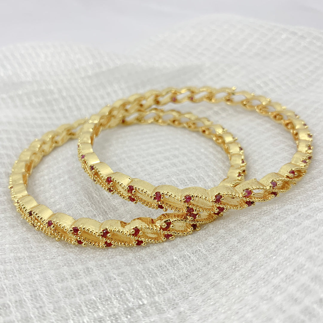 Ethnic traditional gold-plated bangles with ruby stones – timeless jewelry for weddings and festive wear