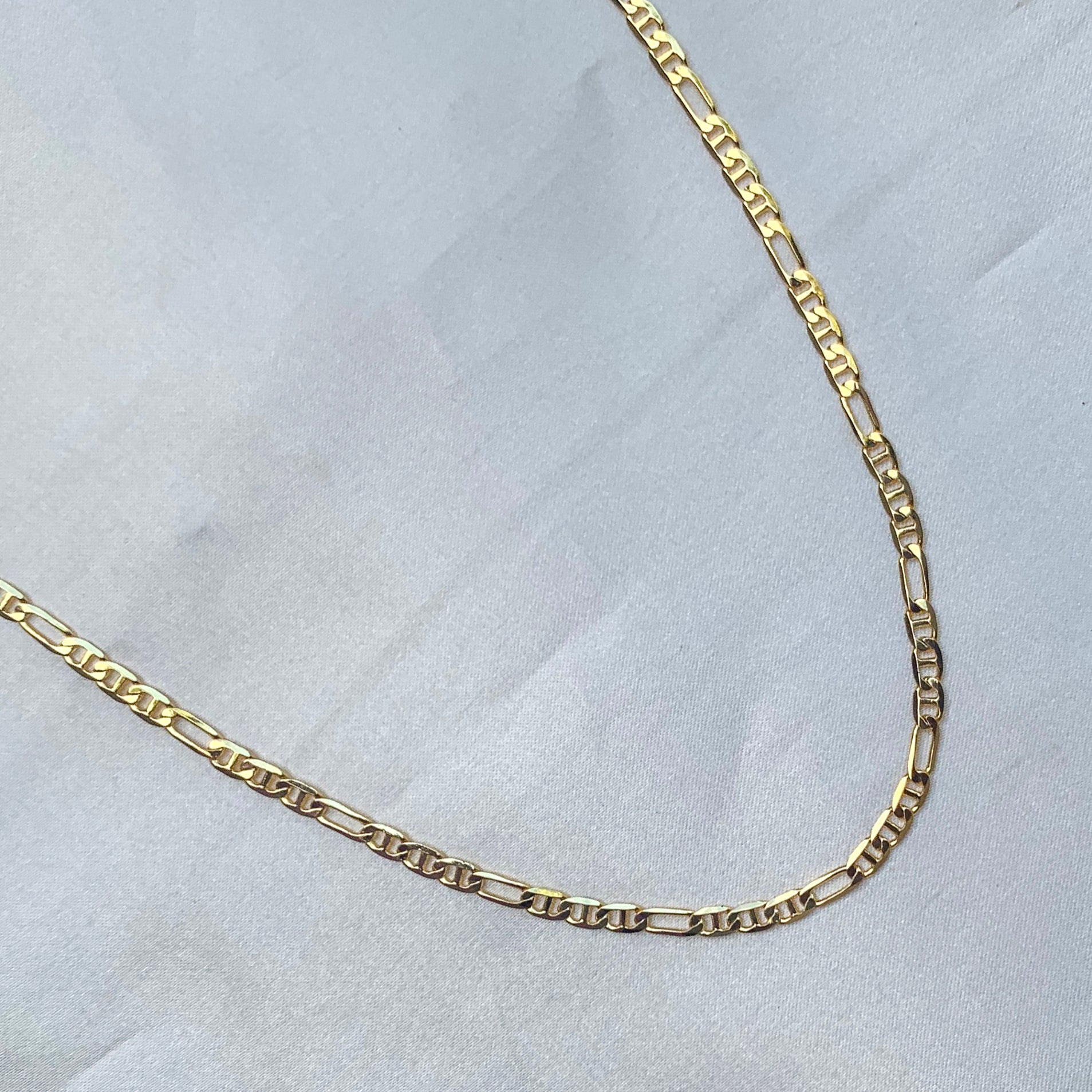 one gram gold plated figaro chain