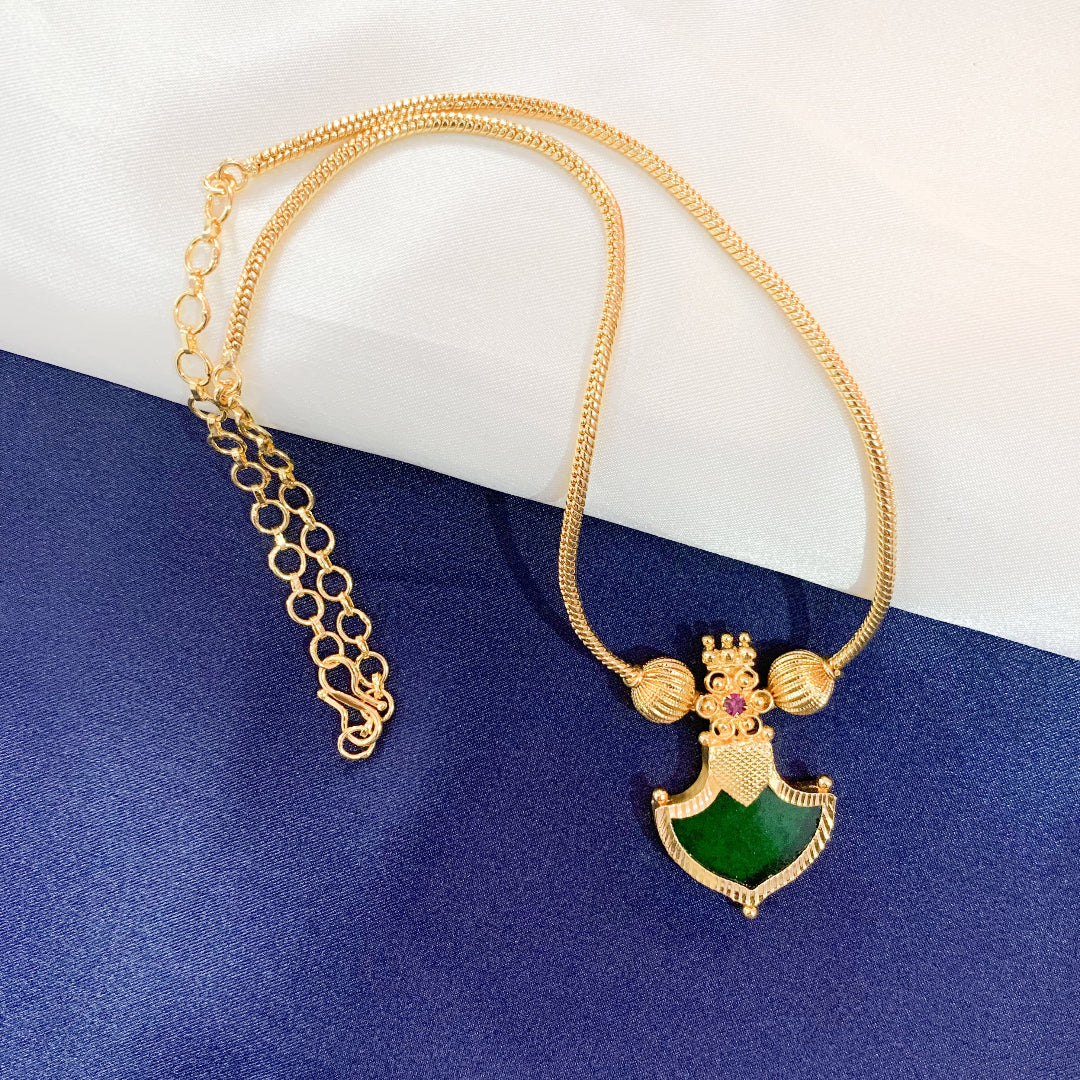 Traditional gold-plated necklace with green Palakka shield pendant – ethnic South Indian jewelry for festive and bridal wear