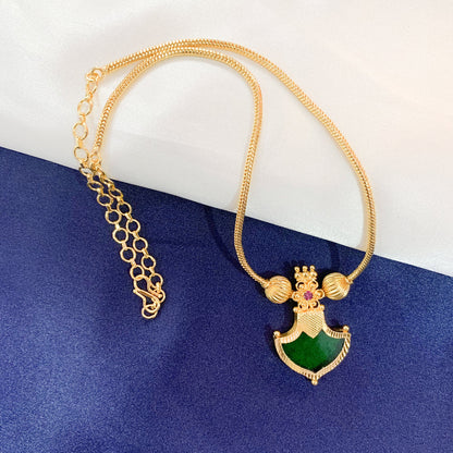 Traditional gold-plated necklace with green Palakka shield pendant – ethnic South Indian jewelry for festive and bridal wear