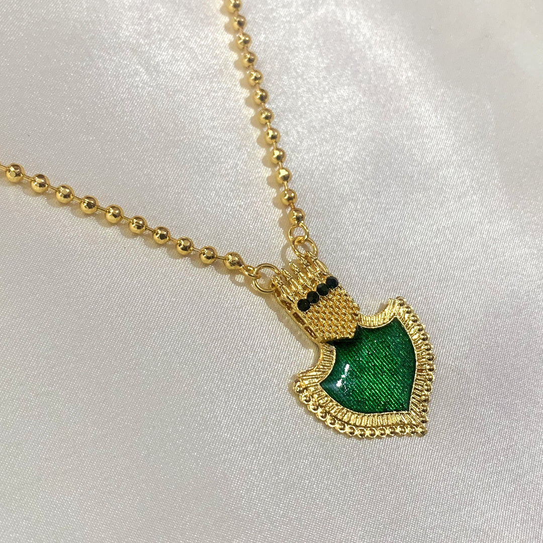 Gold-plated ball chain necklace featuring a green Palakka shield pendant – classic ethnic jewelry for women