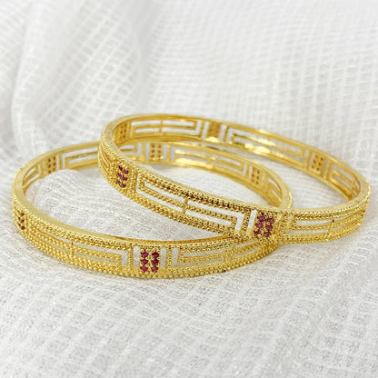 Gold-plated bangles with delicate ruby accents – elegant traditional jewelry for women