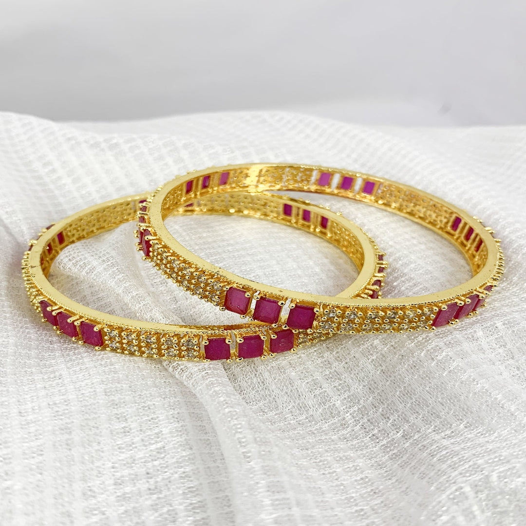 Luxury gold bangles with pink AD and cubic zirconia embellishments – traditional ethnic jewelry for women
