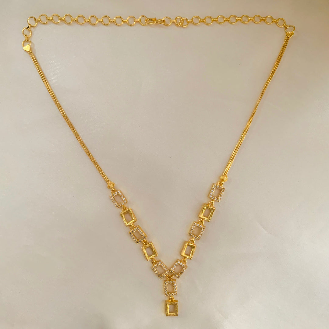Modern geometric gold-plated necklace with AD stones – stylish statement jewelry for women