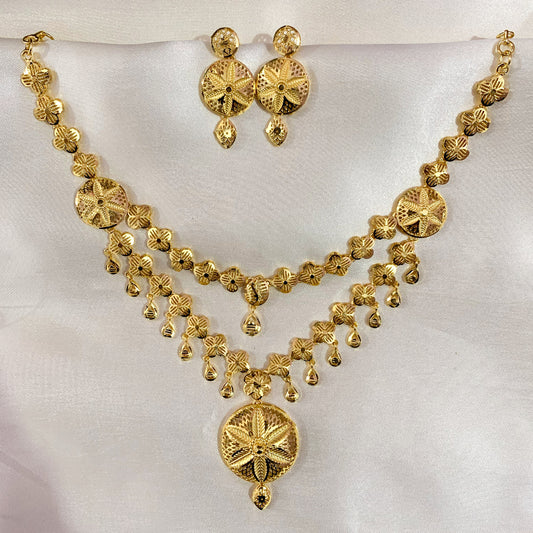 Traditional gold-plated layered floral necklace set with matching earrings – elegant ethnic jewelry for festive and bridal wear