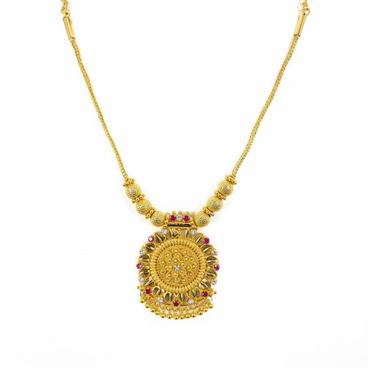 Traditional gold-plated necklace with intricate pendant and ruby accents – ethnic Indian jewelry for festive and bridal wear