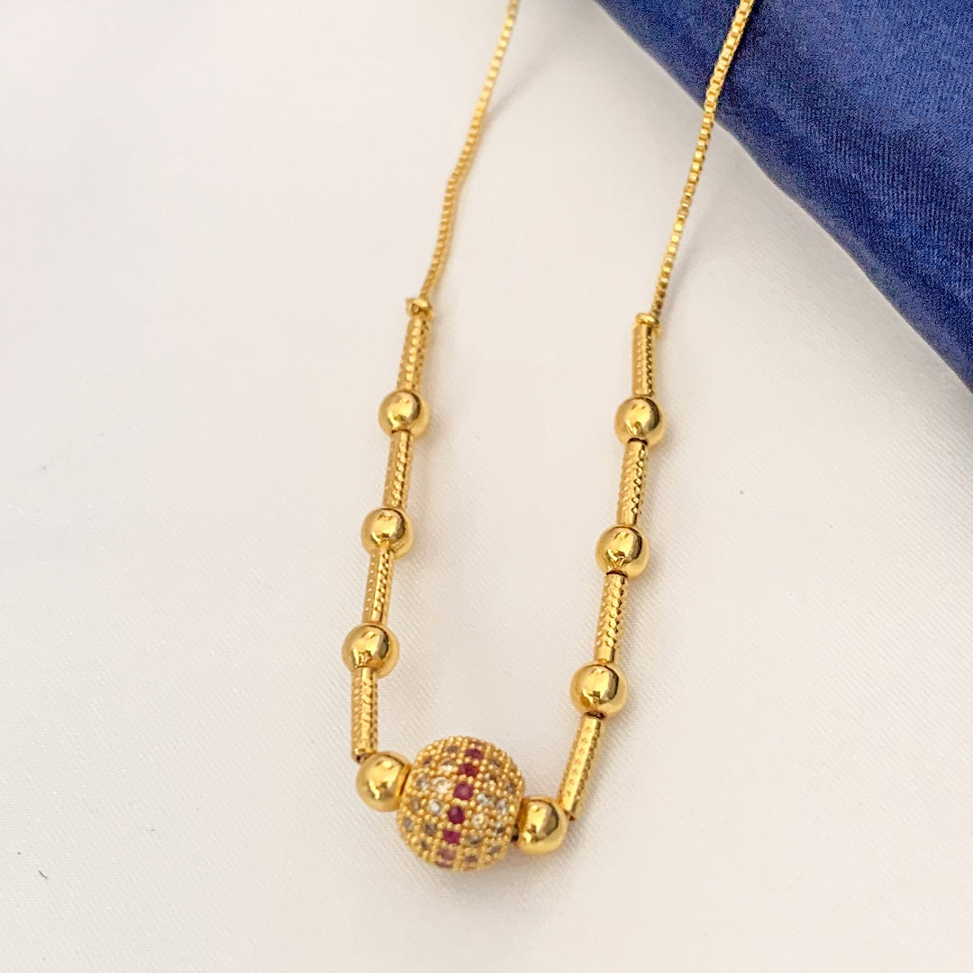 Elegant Gold Plated Beaded Chain Necklace with Red AD Stone Embellished Ball Pendant