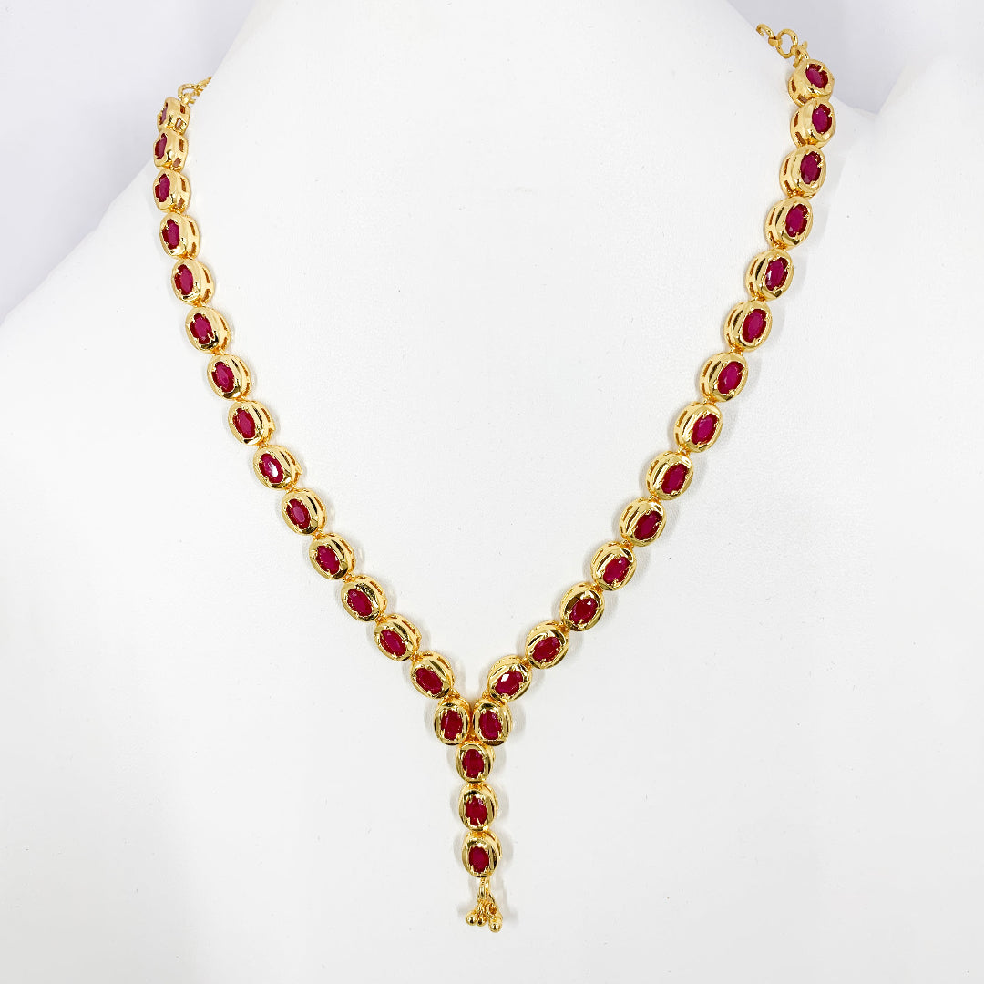 gold-plated necklace with ruby-colored AD stones – graceful and timeless accessory for special events