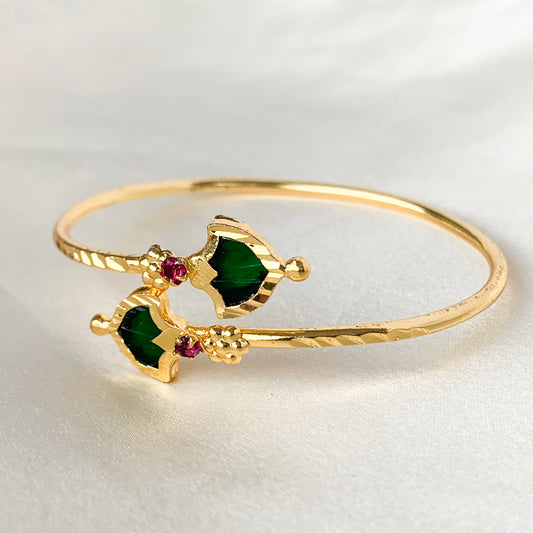 Traditional gold-plated open Palakka bangle bracelet with green and ruby stones – South Indian ethnic jewelry for festive and bridal wear